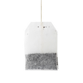 A single hanging teabag