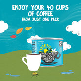 A stylized promotional graphic for House Blend Organic Instant Coffee. A blue coffee can with a Fairtrade logo sits on a green hill beside a white coffee cup, with the text 'ENJOY YOUR 40 CUPS OF COFFEE FROM JUST ONE PACK' above on a bright blue sky background with clouds and leaves.